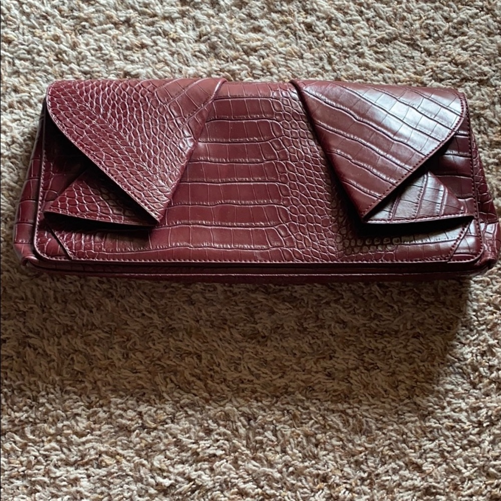 Bebe maroon clutch